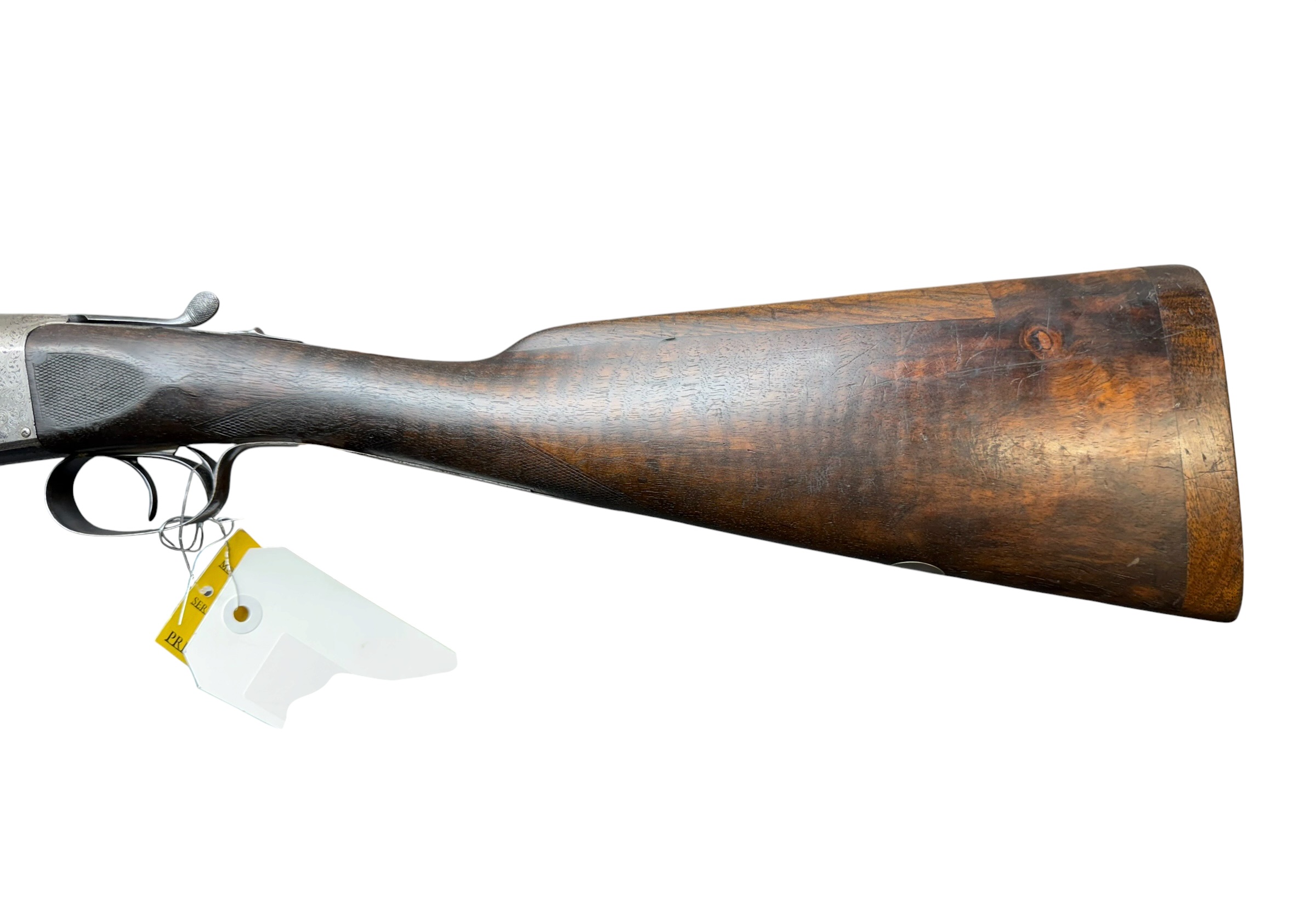 IMG_5315-Photoroom - OWS-Ammo Side view of a classic double-trigger shotgun with a wooden stock and metal receiver on a white background.