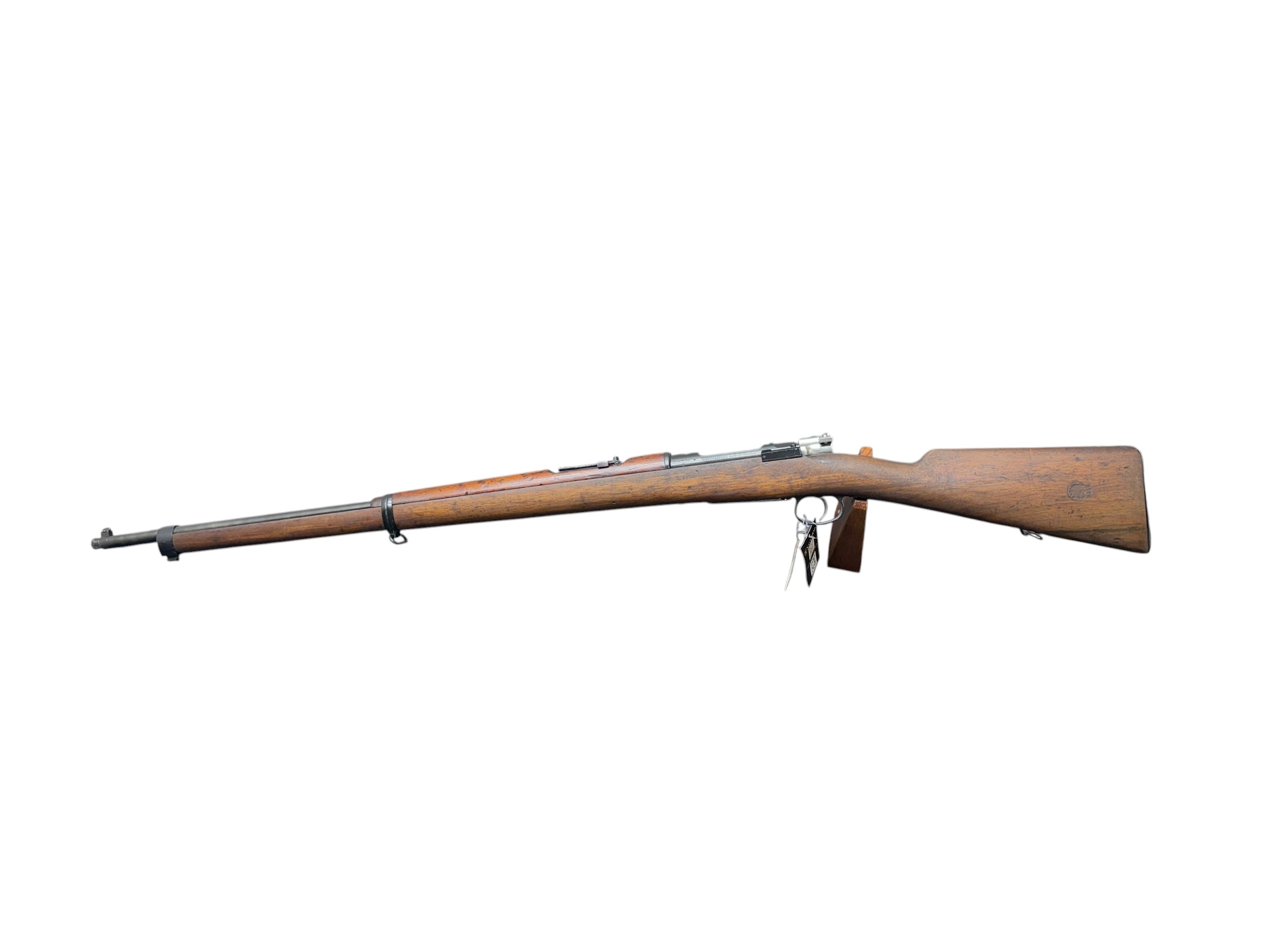 IMG_5326-Photoroom - OWS-Ammo Long bolt-action rifle with wooden stock lying horizontally on a white background.
