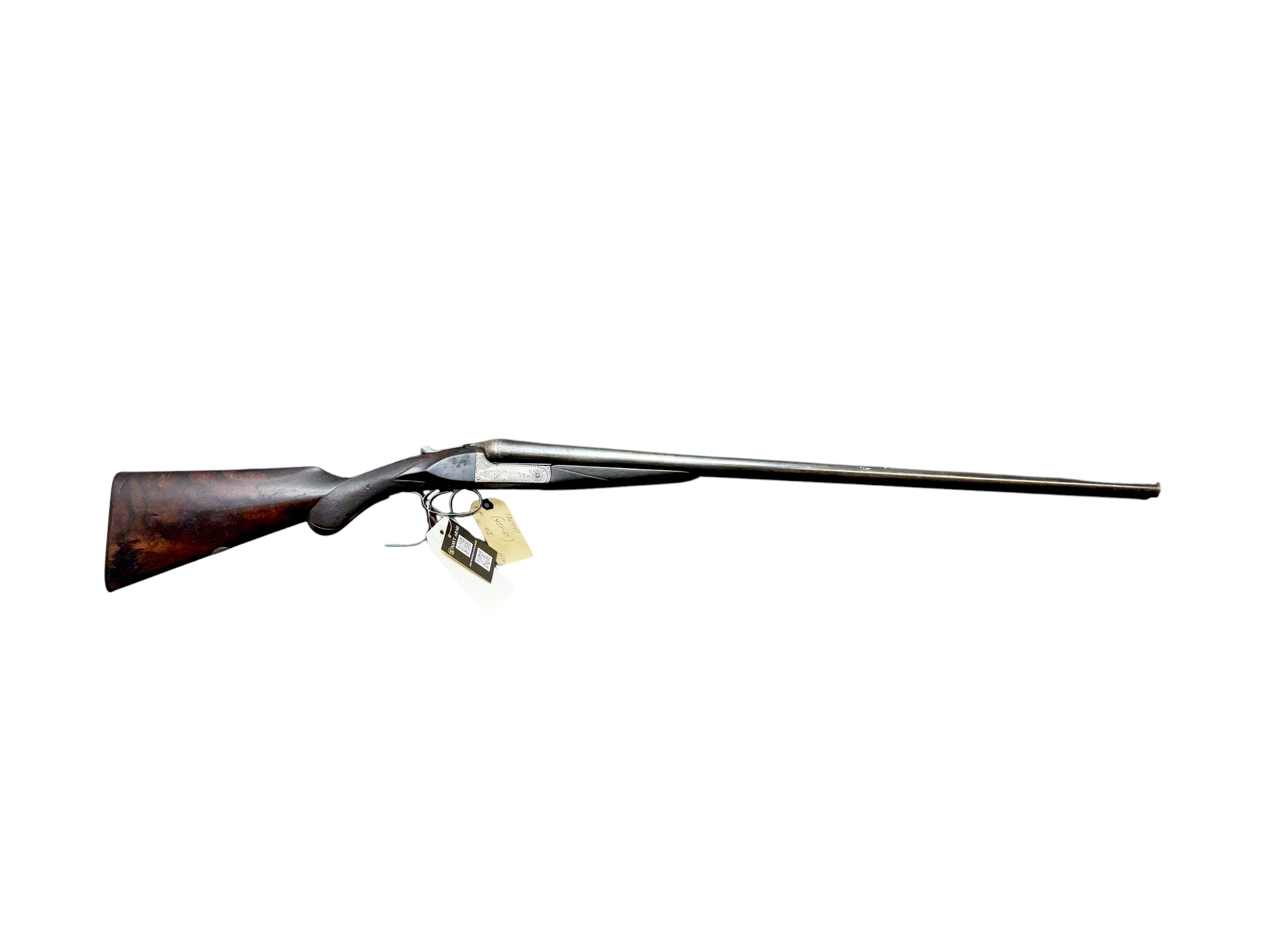 IMG_5378-Photoroom - OWS-Ammo Side view of a long-barreled lever-action rifle with a wooden stock and hanging price tags on a white background.