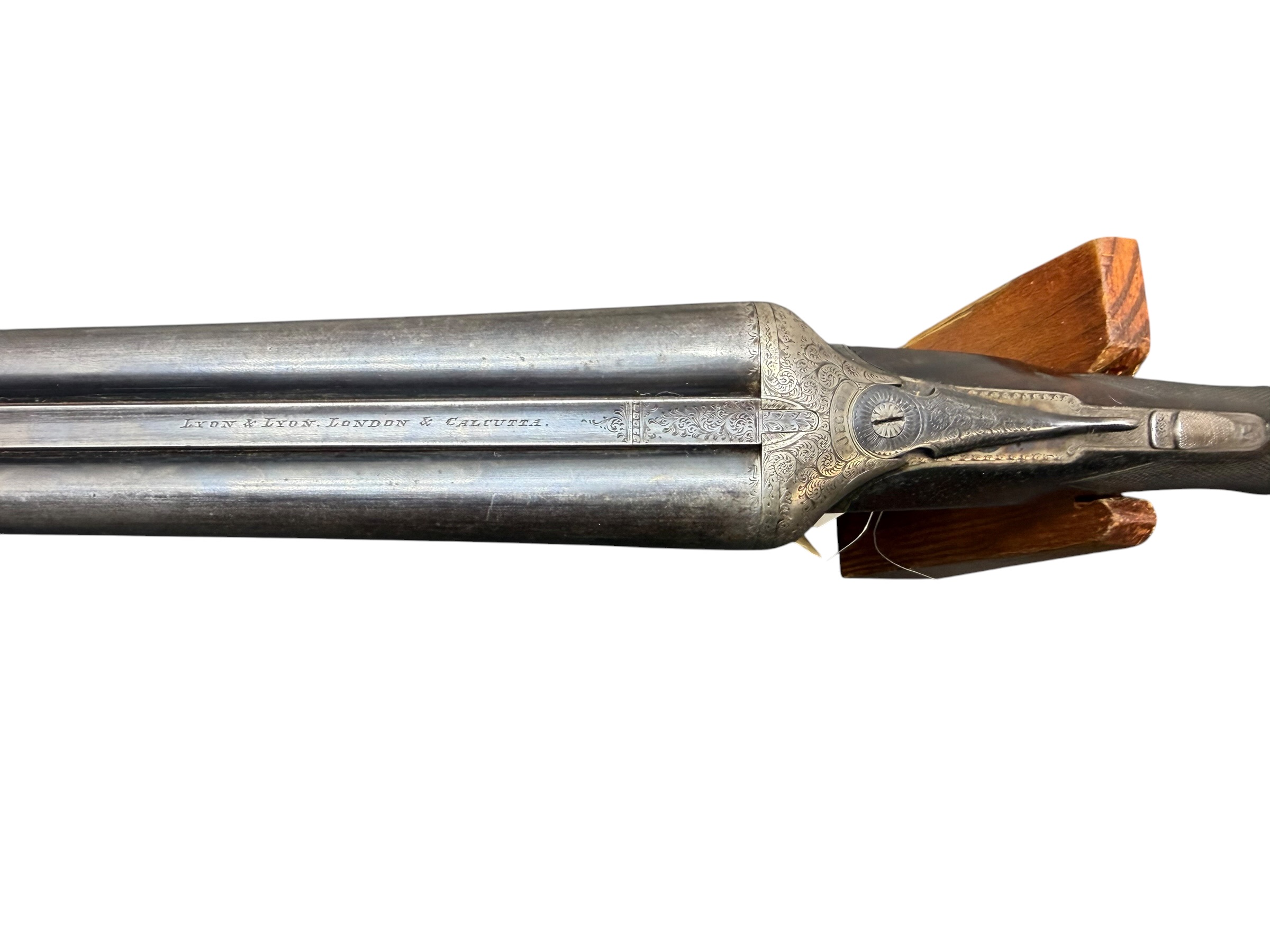 IMG_5385-Photoroom - OWS-Ammo Antique muzzle-loading rifle with engraved metalwork and a wooden stock, shown in side view.