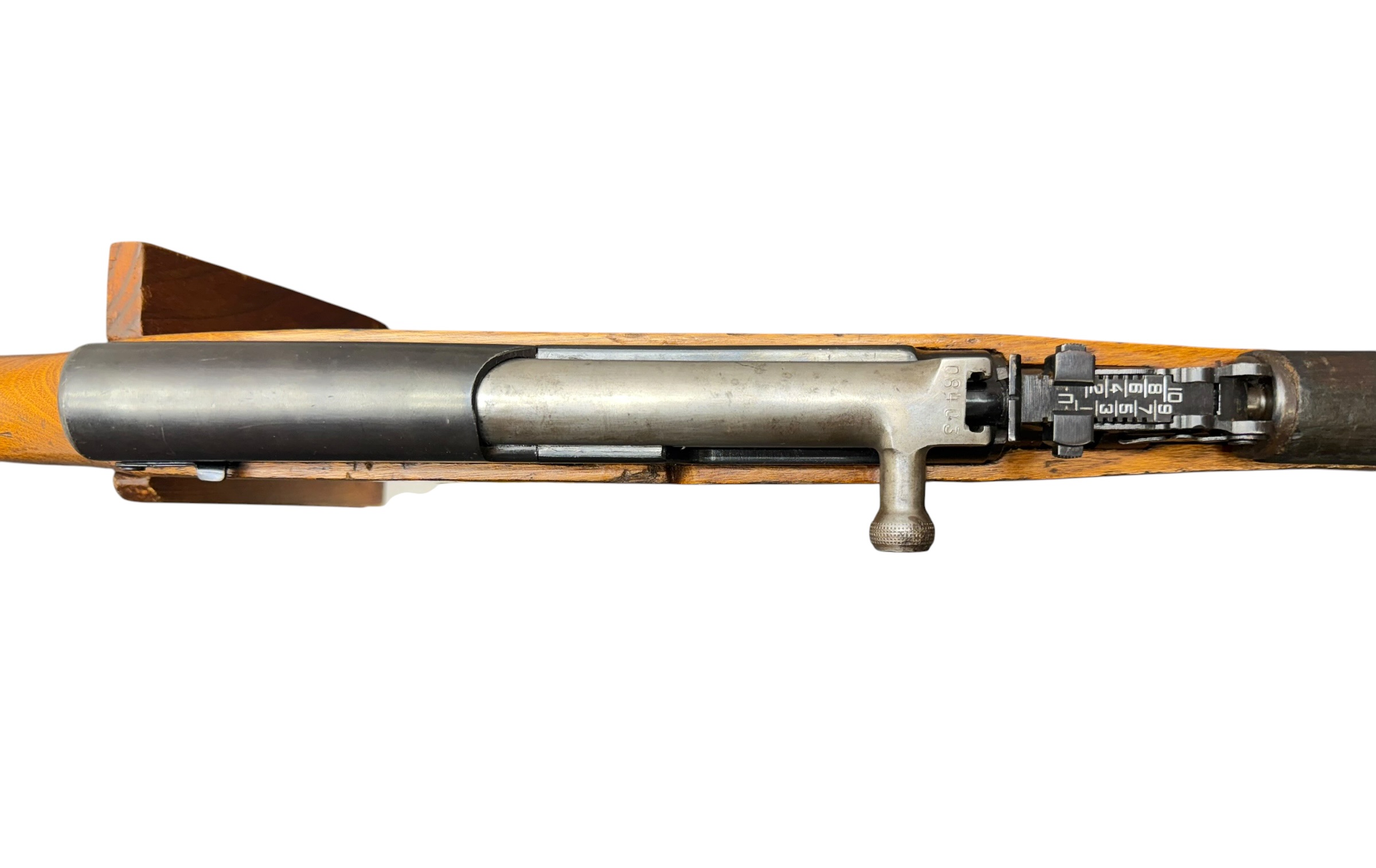 Bolt-action rifle shown from the side with a wooden stock and metal barrel and bolt mechanism visible