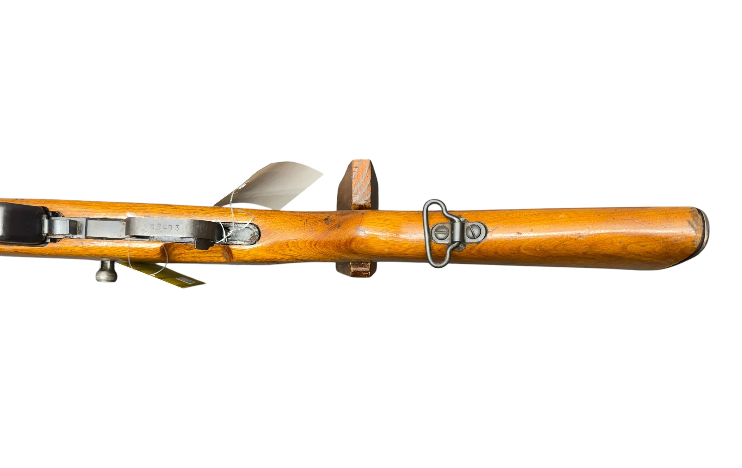 Side view of a wooden bolt-action rifle with metal hardware and sights, laid along a white background.